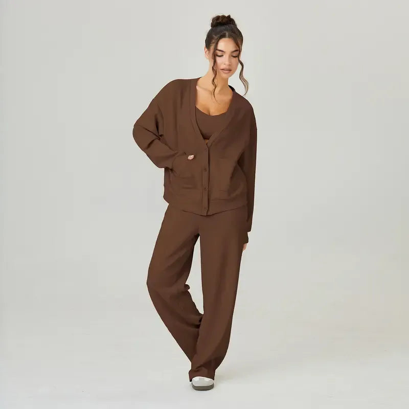 Stylish women's two-piece knit lounge set. Soft, relaxed fit cardigan and matching trousers, perfect for comfort.