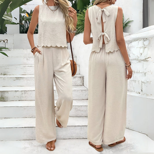 Women's comfortable knit two-piece lounge set with sleeveless top & elastic waist shorts, perfect for summer casual wear.