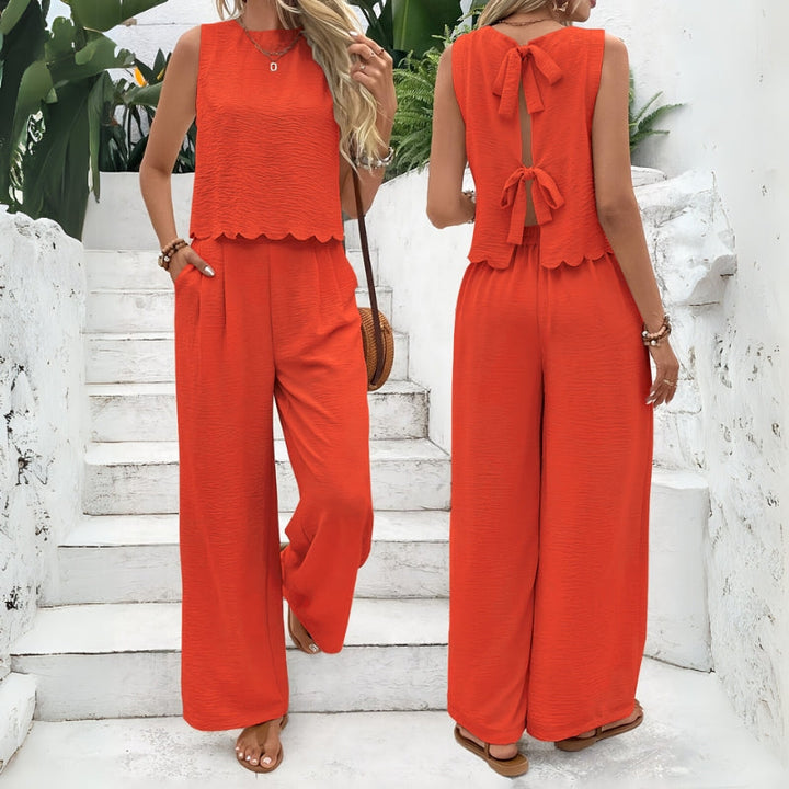 Comfortable women's two-piece lounge set in a knit blend. Relaxed fit sleeveless top and shorts for summer.