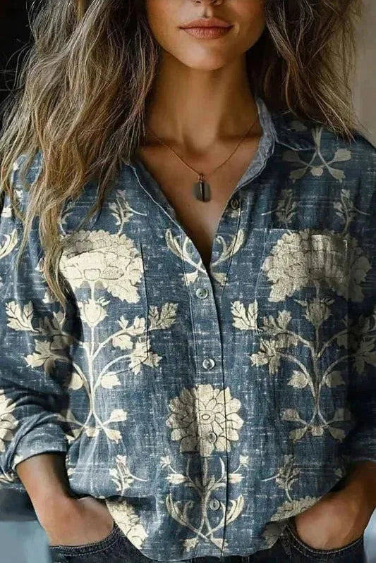 Elegant long-sleeve women's blouse, versatile for professional office wear or a sophisticated casual look.