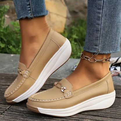 Stylish beige women's walking loafers, comfortable and orthopedic for all-day arch support.