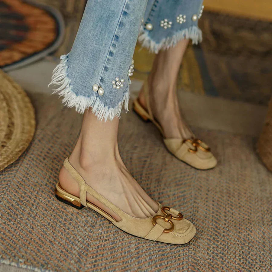 Side view of women's comfortable orthopedic sandals. Featuring robust foot and arch support for elegant summer daily wear.