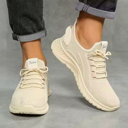 Athletic women's sneakers offering superior comfort and orthopedic support for an active lifestyle.