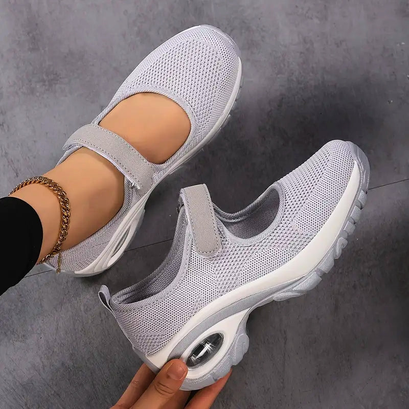 Pair of women's comfortable orthopedic walking shoes, stylish and supportive for casual everyday wear.
