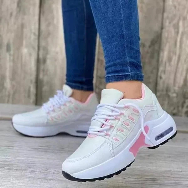 Supportive women's orthopedic sneakers, designed for pain relief and posture during daily walks.
