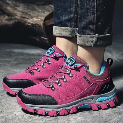 Women's comfortable pink & gray trail hiking shoes, durable outdoor footwear for rugged terrain