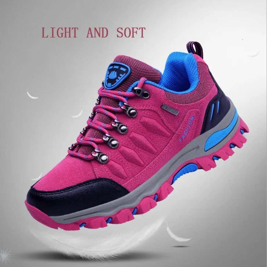Pair of women's durable trail hiking shoes in a stylish pink and gray color scheme