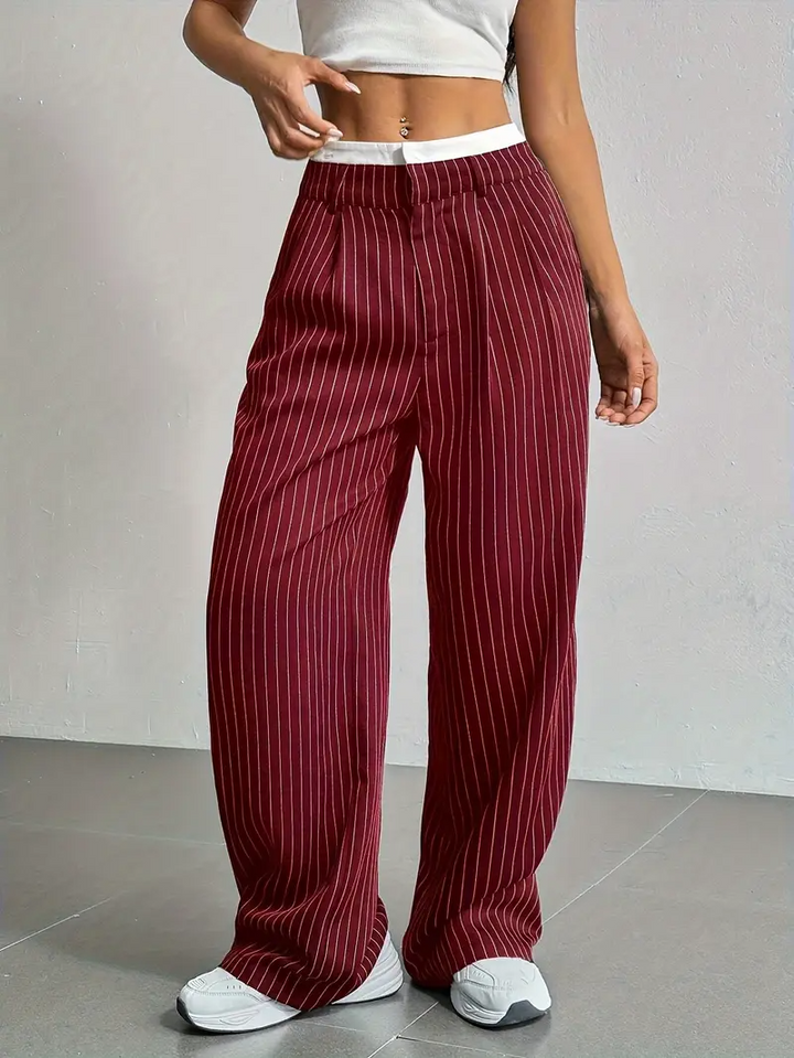 Versatile women's pinstripe wide-leg pants, ideal for comfortable daily wear and adaptable styling.