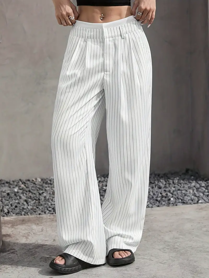 Relaxed yet elegant women's pinstripe wide-leg trousers, offering versatile style for any wardrobe.