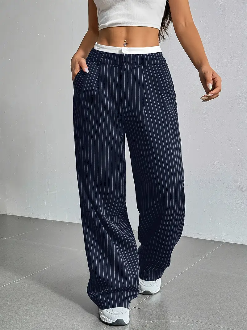 Streetwear-inspired pinstripe wide-leg pants for women, offering a comfortable and effortlessly cool look.