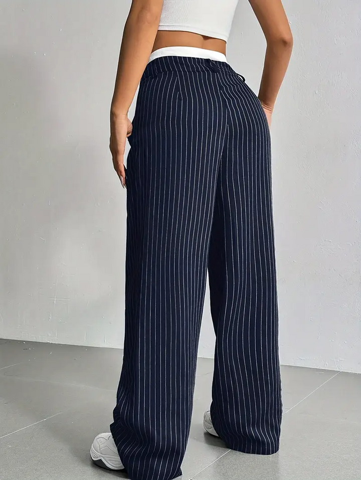 Soft and comfortable women's pinstripe wide-leg trousers, designed for all-day ease and chic style.