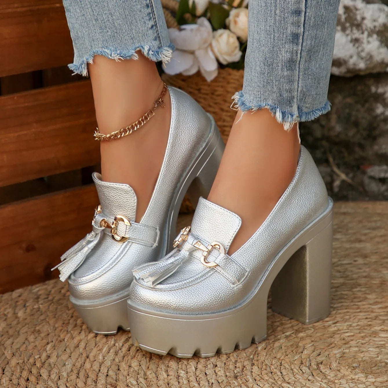 Elegant women's platform loafers, ensuring comfort and stability with a chunky heel and arch support.