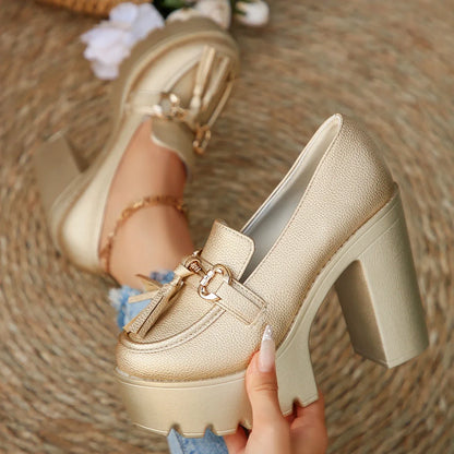 Fashionable women's tassel platform loafers, featuring a chic gold buckle and comfort design.