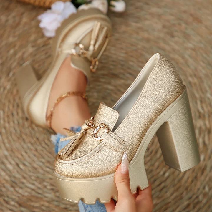 Fashionable women's tassel platform loafers, featuring a chic gold buckle and comfort design.