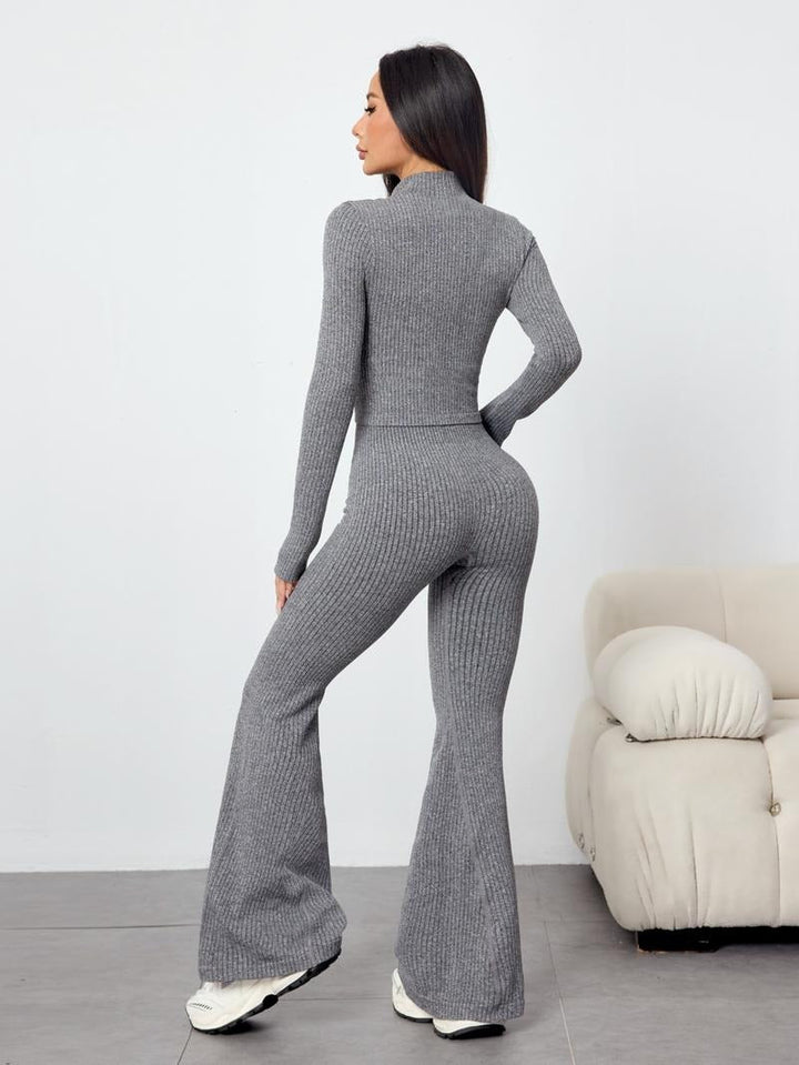 Versatile women's long sleeve ribbed knit top, paired with elegant flare pants in a comfortable two-piece set.
