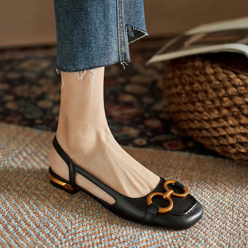 Versatile women's slip-on slingback flats, comfortable for daily wear, featuring a gold chain.