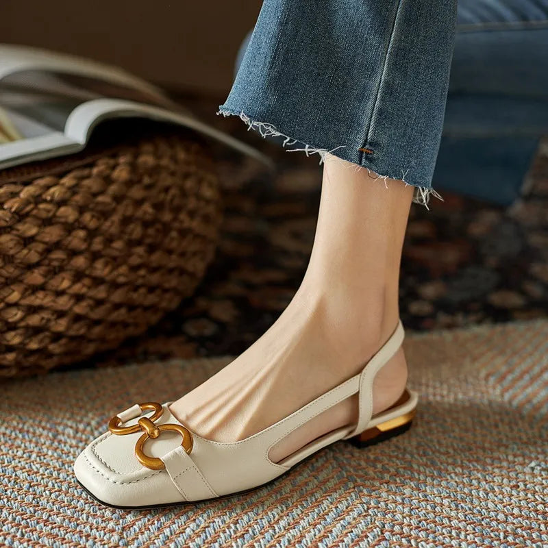 Stylish women's slingback flats: gold-tone chain detail, ideal for both dressy and casual outfits.