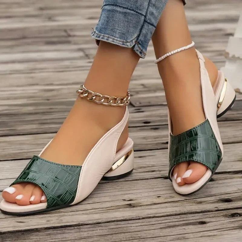 Everyday summer fashion: comfortable women's slingback slip-on sandals with elegant croc texture & low heel.