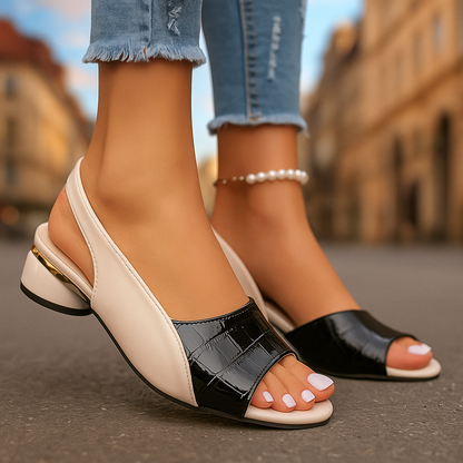 Versatile women's slingback sandals, easy slip-on style, comfortable low heel perfect for summer fashion.