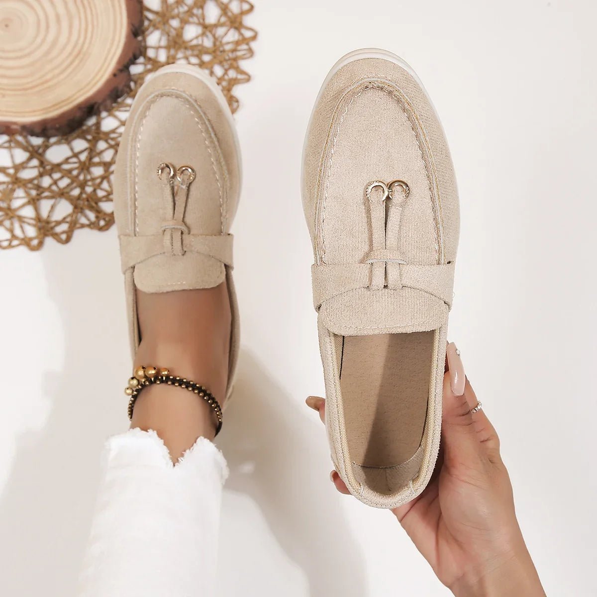 Women's comfortable slip-on loafers with elegant double ring accent, perfect for everyday wear.
