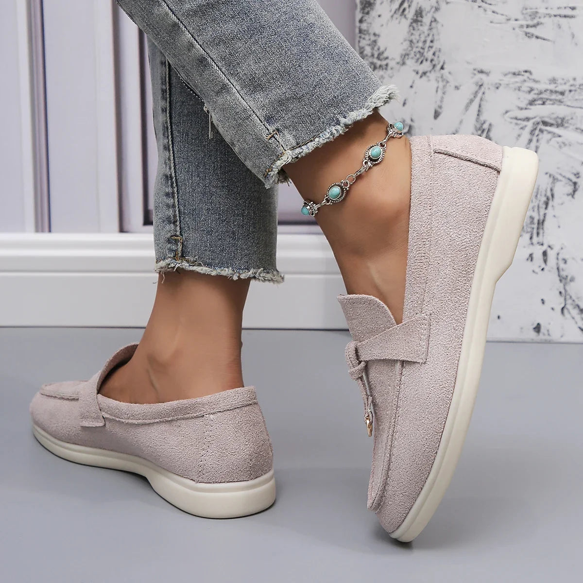 Modern design women's slip-on loafers, comfortable flats with a chic double ring accent.