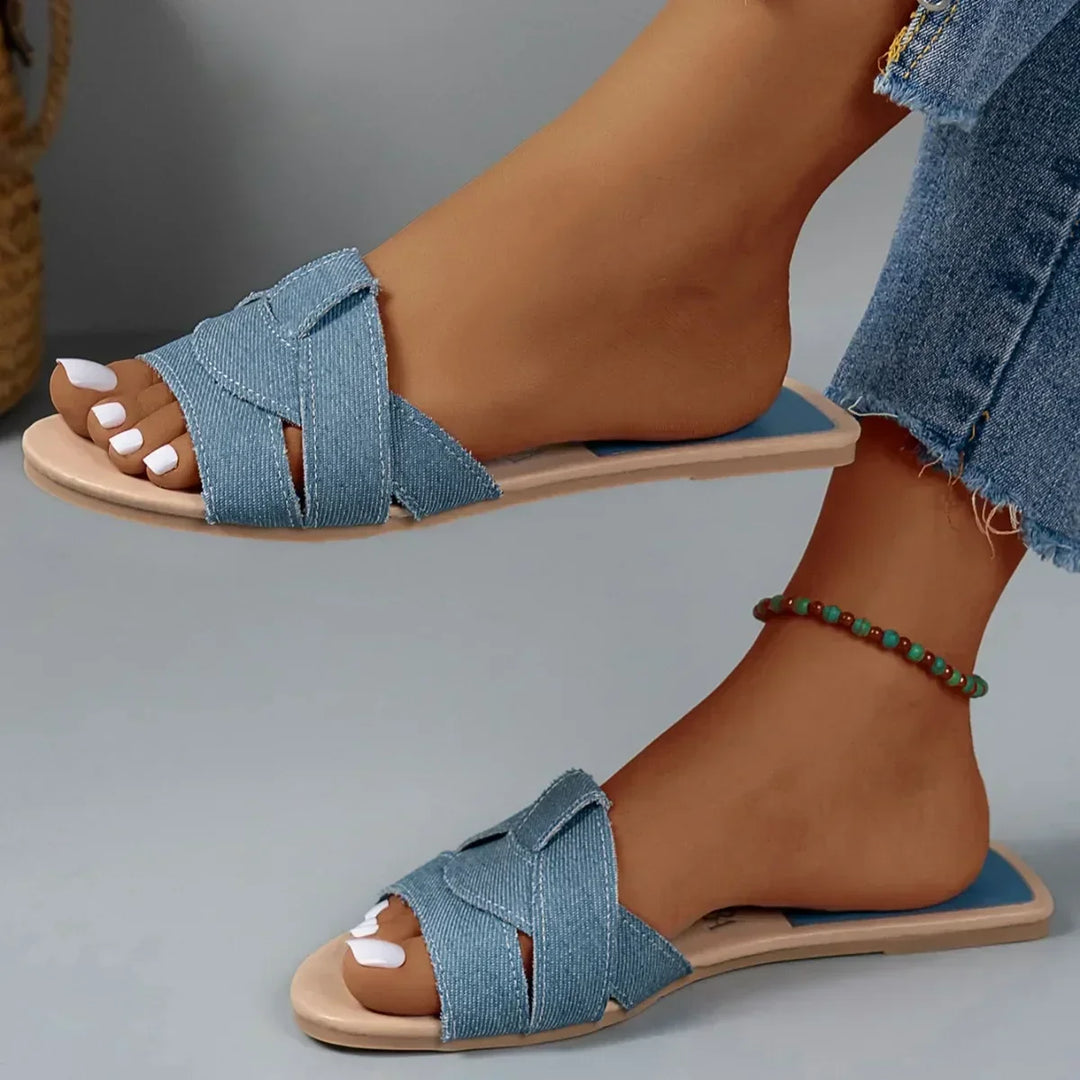Easy slip-on women's slide sandals for effortless daily comfort & chic summer footwear.