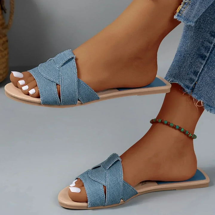 Easy slip-on women's slide sandals for effortless daily comfort & chic summer footwear.