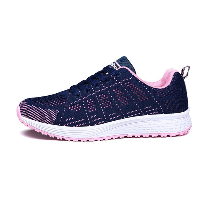 Lightweight women's walking sneakers with adjustable straps & supportive cushioned insole for all-day comfort.