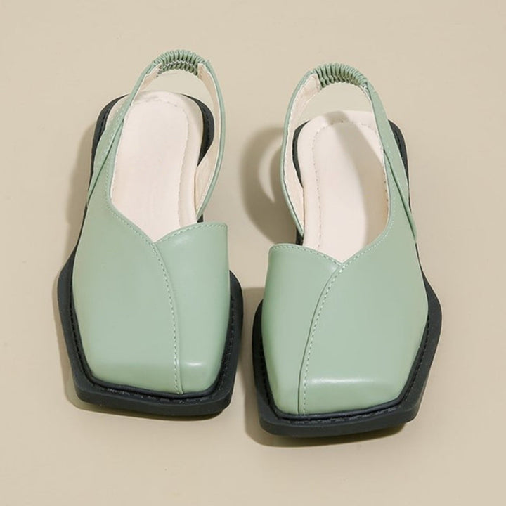 Easy-to-wear women's square-toe slip-on flats. Comfortable footwear for modern casual outfits.
