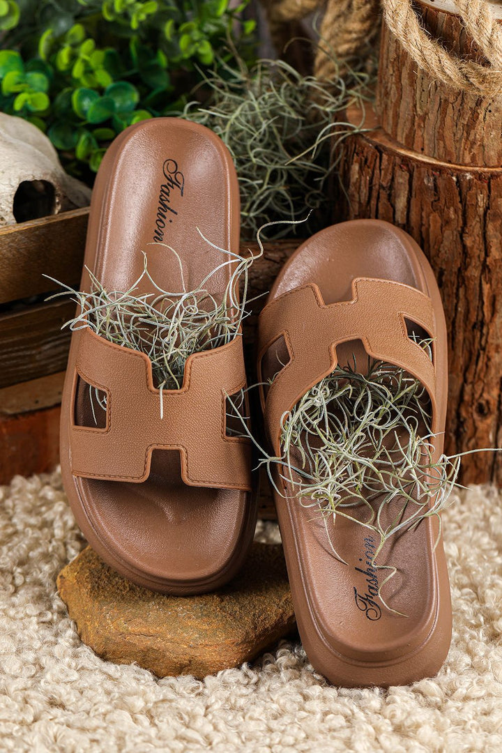 Women's open-toe strappy summer slippers, comfortable & lightweight, ideal for relaxed holiday comfort.