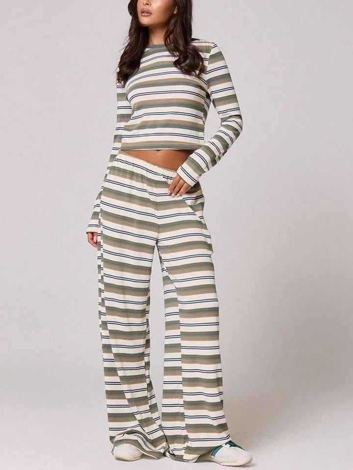 Elegant women's striped knit lounge outfit. A comfortable two-piece set for chic casual or home wear.