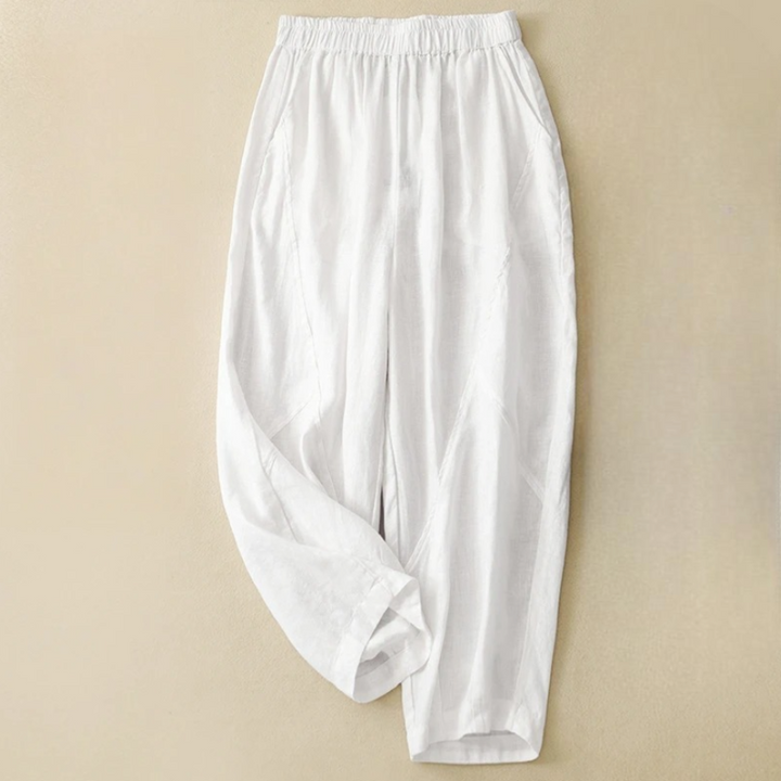 Full shot of women's comfortable tapered pants, showcasing relaxed fit & elastic waist. Great for versatile daily style.