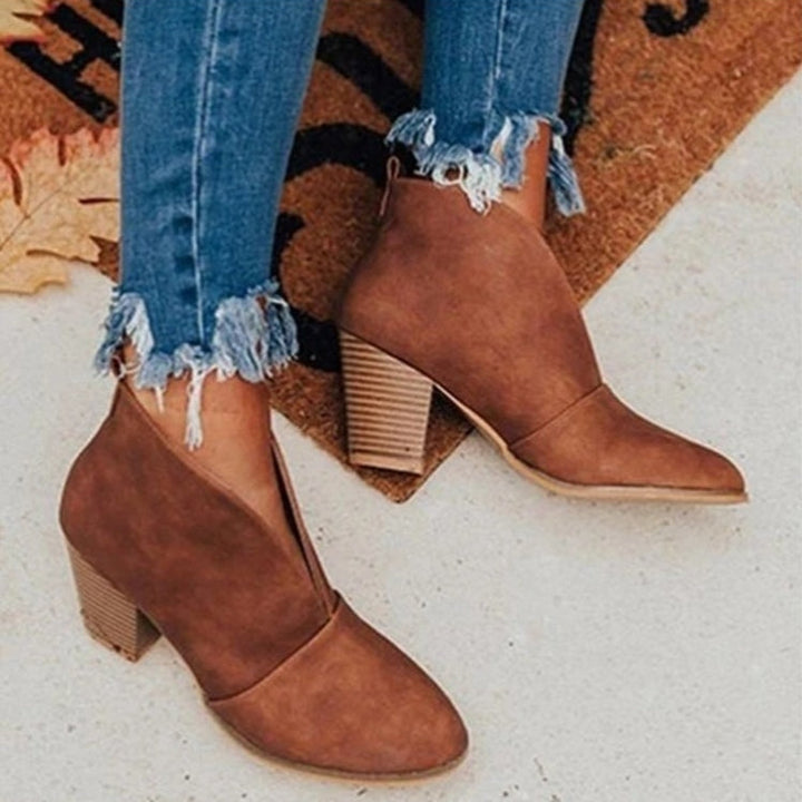 Women's comfortable V-cut ankle boots in black, perfect for stylish everyday wear & fall fashion. Supportive casual footwear.