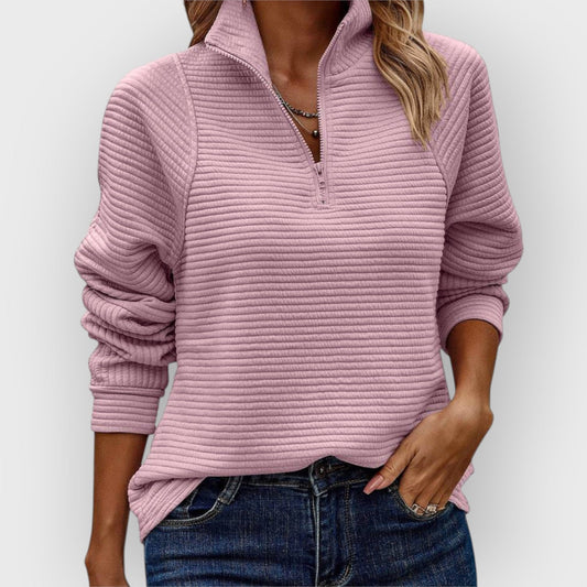Women's comfortable V-neck pullover sweater. Soft, stylish long sleeve for versatile fall & spring fashion.