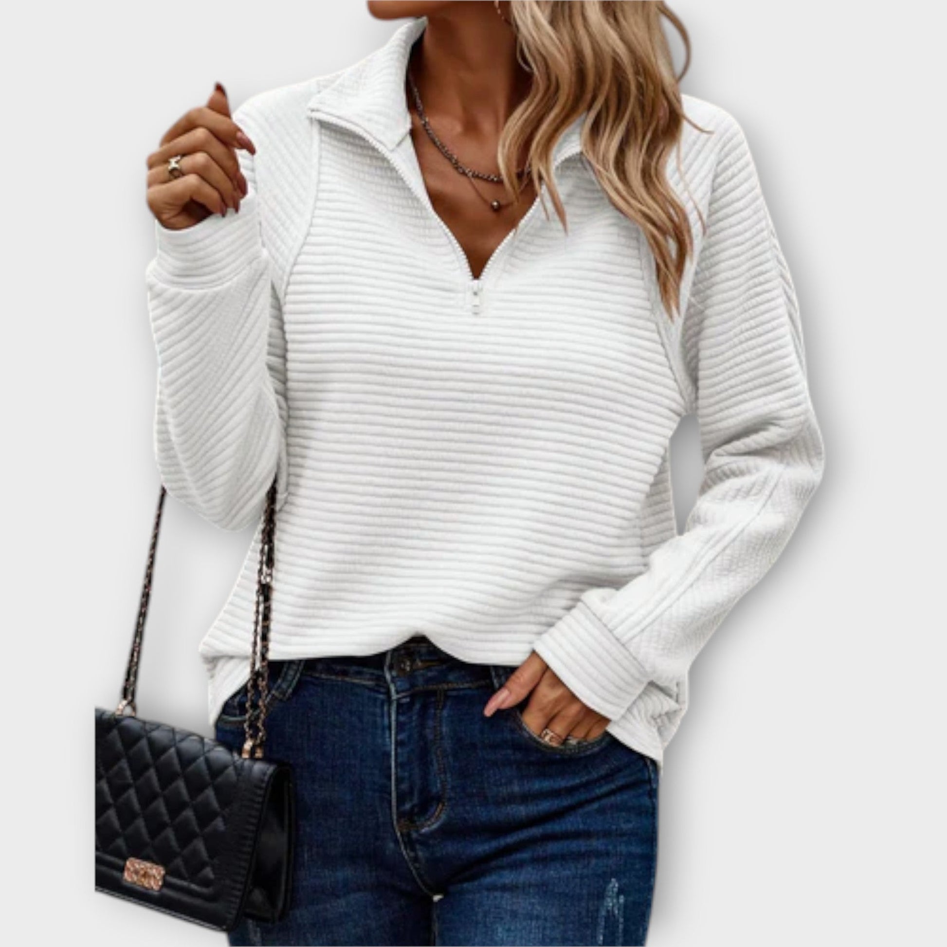 Elegant women's V-neck long sleeve sweater. Comfortable pullover style, perfect for fall and spring fashion.