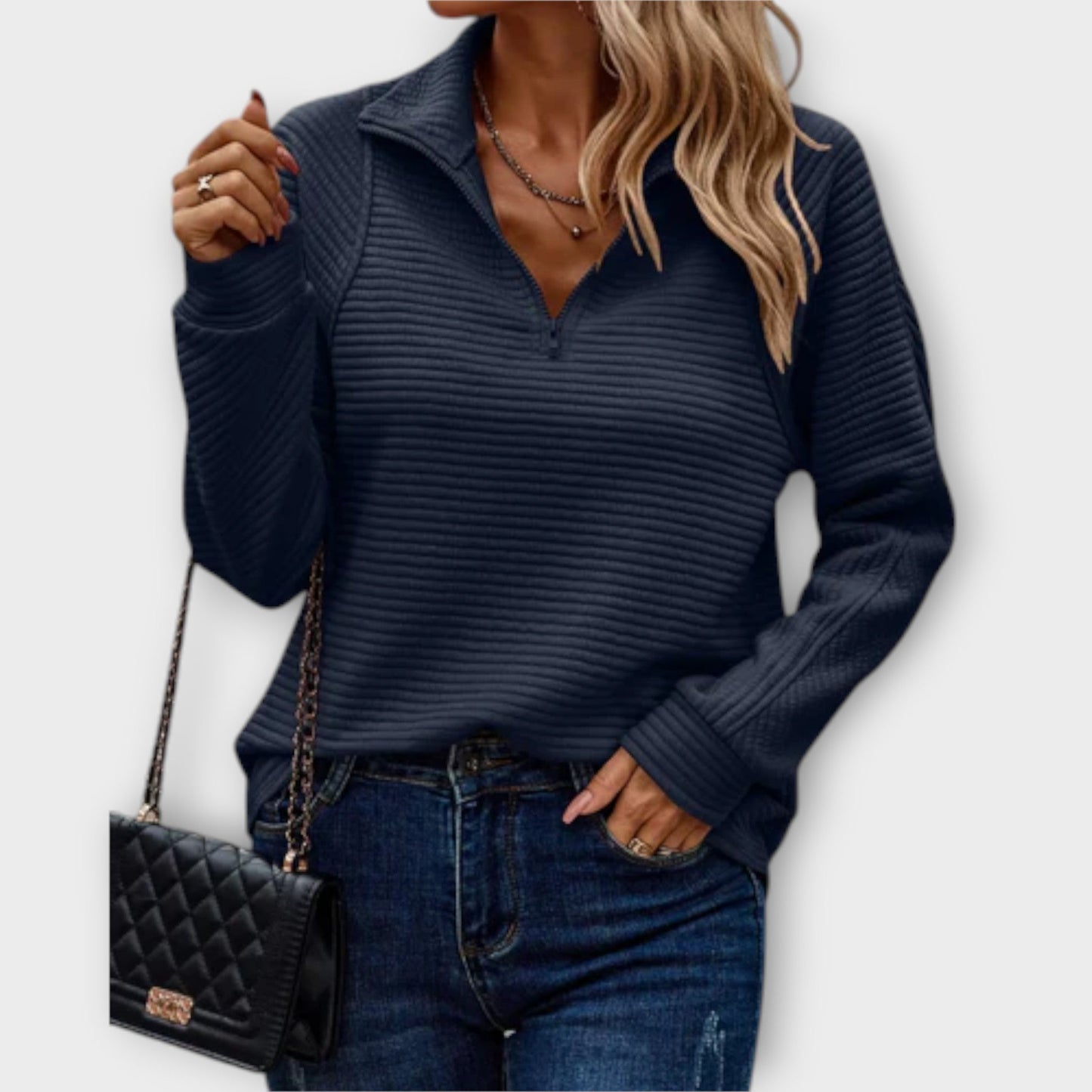 Chic women's V-neck sweater. Pullover long sleeve design offering comfort & style for versatile wear.