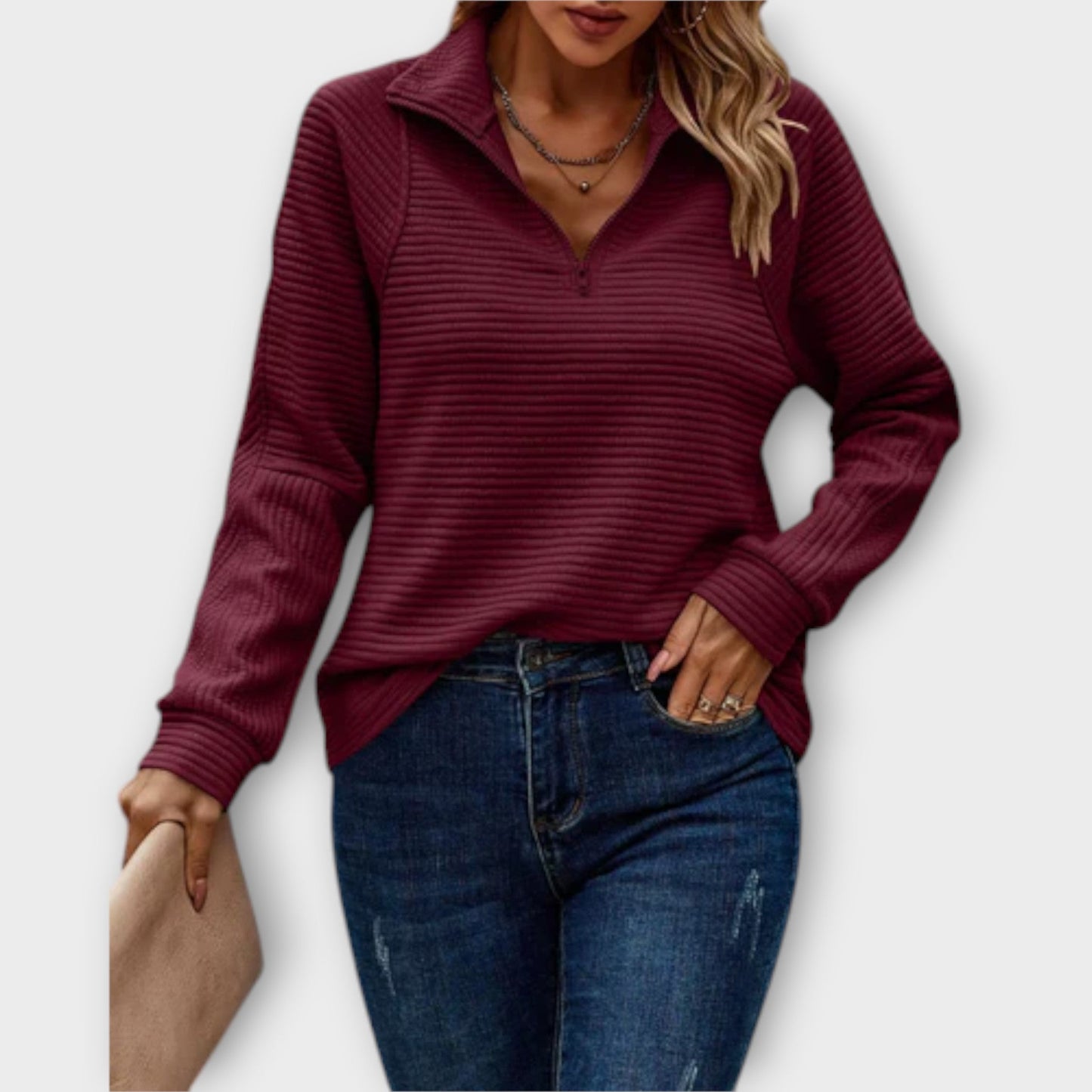 Classic women's V-neck long sleeve sweater. Combines comfort, elegance, and style for any season.