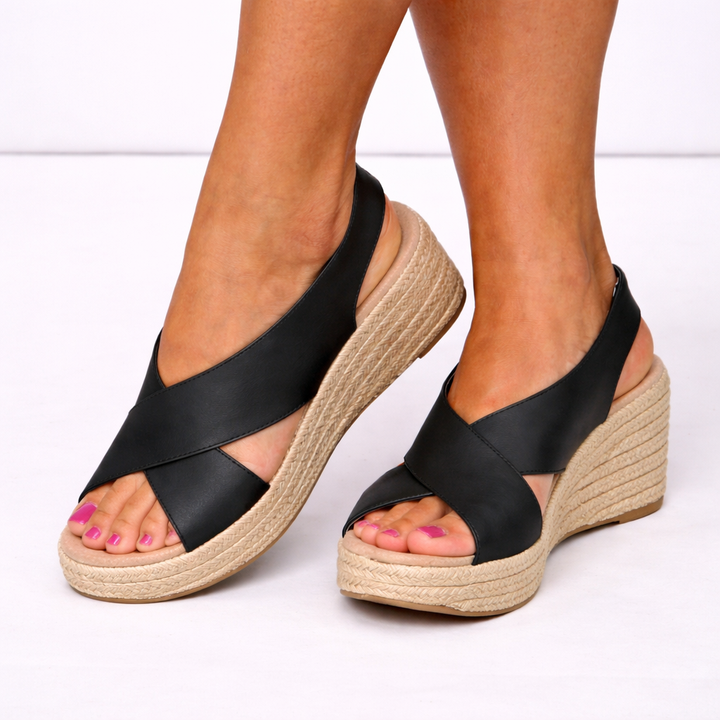 Women's comfortable wedge sandals with stylish crossover straps, perfect for casual summer everyday wear.
