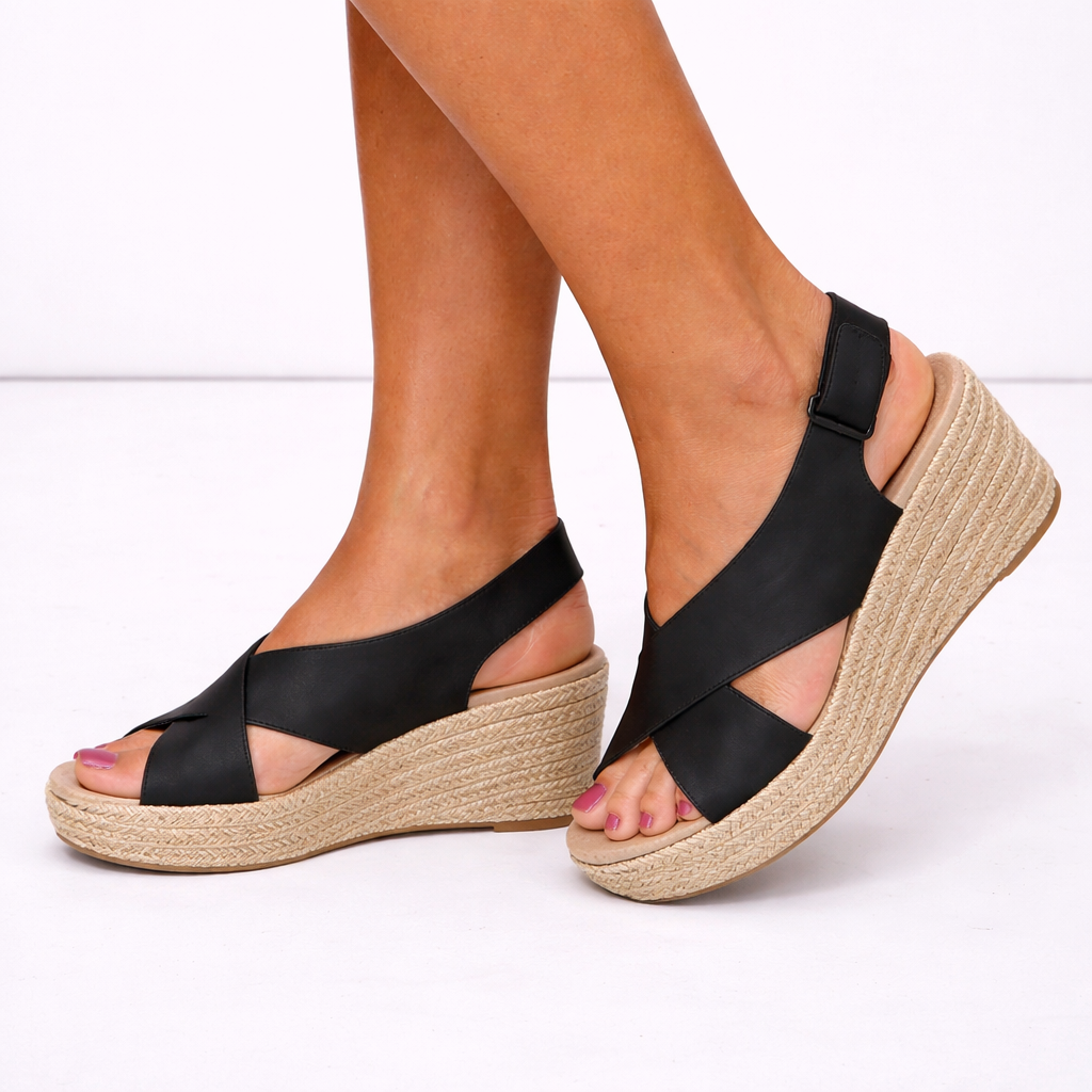 Elegant women's summer wedge sandals with comfortable crossover straps, great for casual and stylish outfits.