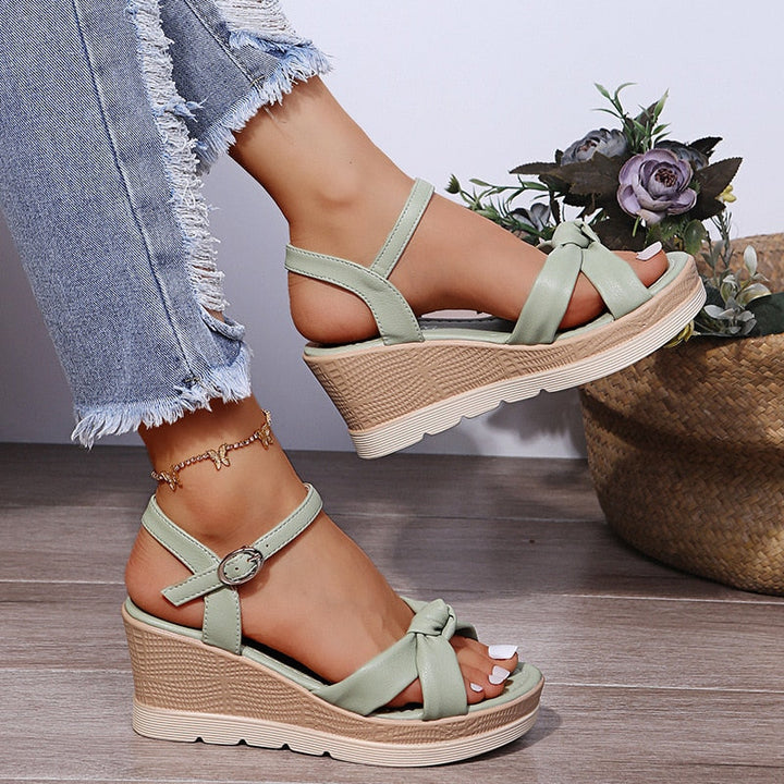 Everyday chic women's platform wedge sandals with an ankle strap, designed for ultimate comfort.
