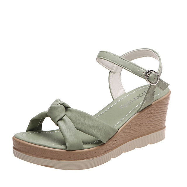 Women's green platform wedge sandals, perfect casual summer shoes with a comfortable ankle strap.