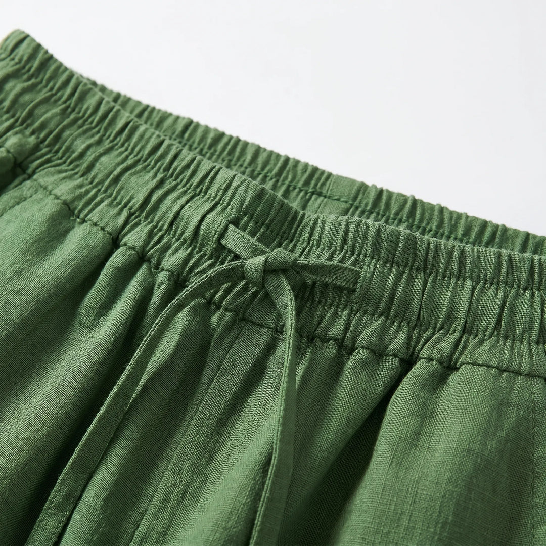 Stylish solid color women's wide-leg trousers, designed for casual everyday wear with a comfortable elastic waist.