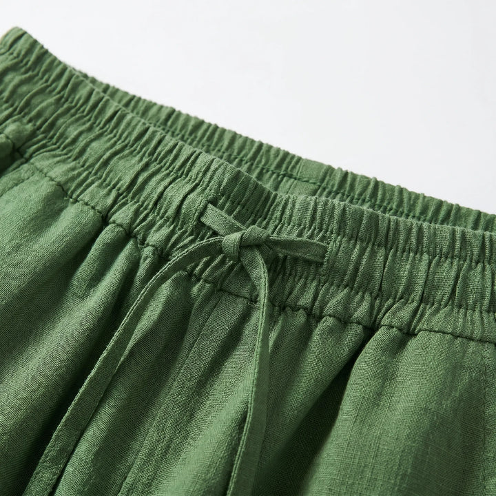 Stylish solid color women's wide-leg trousers, designed for casual everyday wear with a comfortable elastic waist.