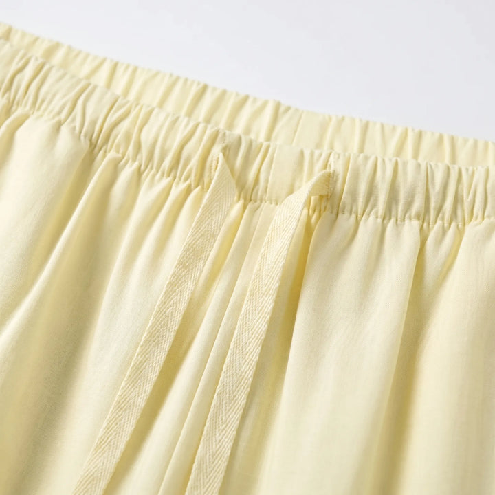 Solid color wide-leg summer pants for women, featuring a comfortable drawstring waist.