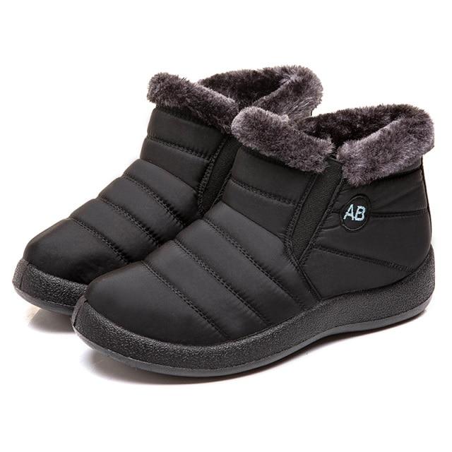 Stylish women's winter boots in dark brown, comfortable ankle footwear for everyday adventures.