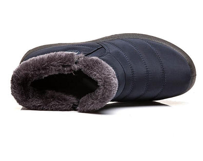 Women's fashion winter boots paired with casual jeans, showcasing everyday style and comfort.