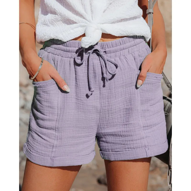 Ultra-comfy women's drawstring shorts, perfect for lounging or active summer days, with pockets.