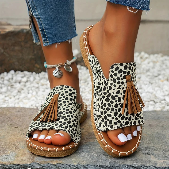 Vibrant women's slip-on flats, comfortable walking sandals for everyday casual style.
