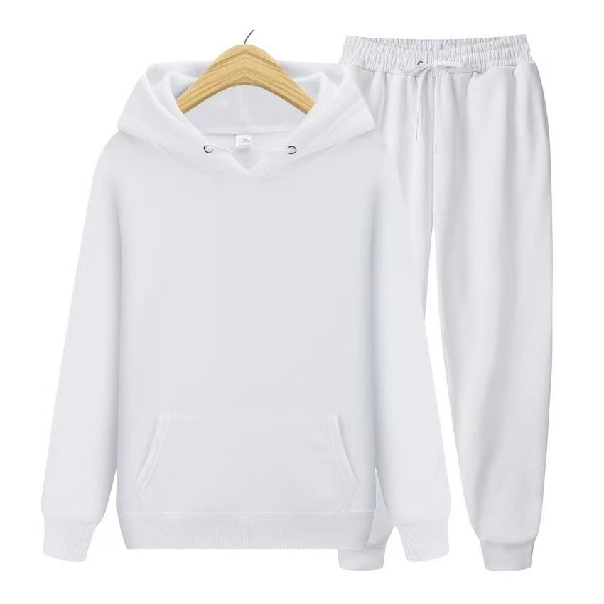 Travel attire for women: comfortable 2-piece hooded sweatshirt & jogger set for long journeys.