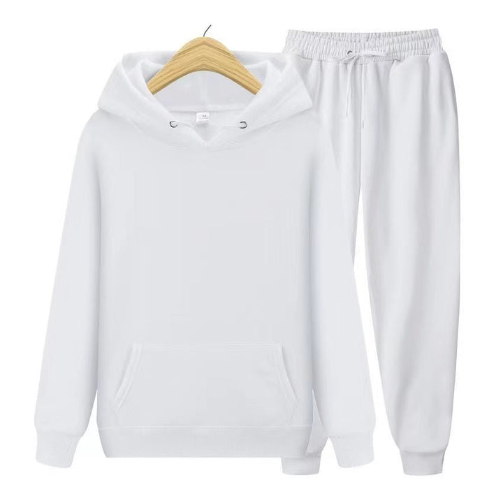 Travel attire for women: comfortable 2-piece hooded sweatshirt & jogger set for long journeys.